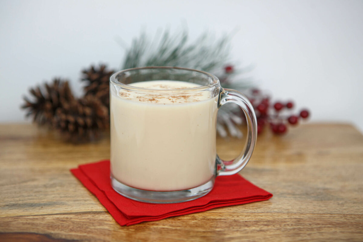 Dysphagia-friendly egg nog on red napkin