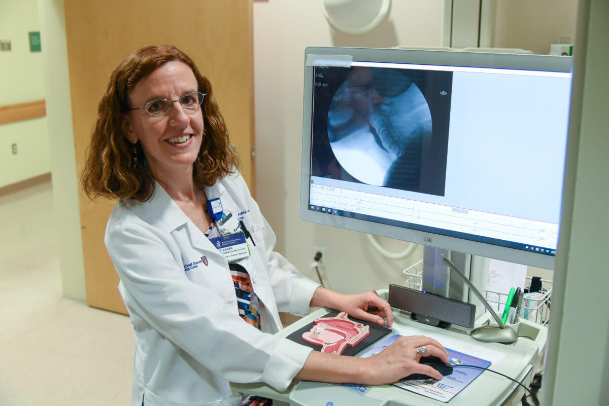 Karen Sheffler looking at x-ray