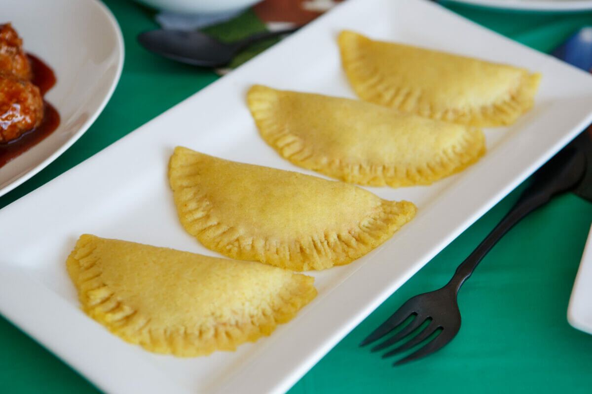 Dysphagia-friendly empanadas on white plate