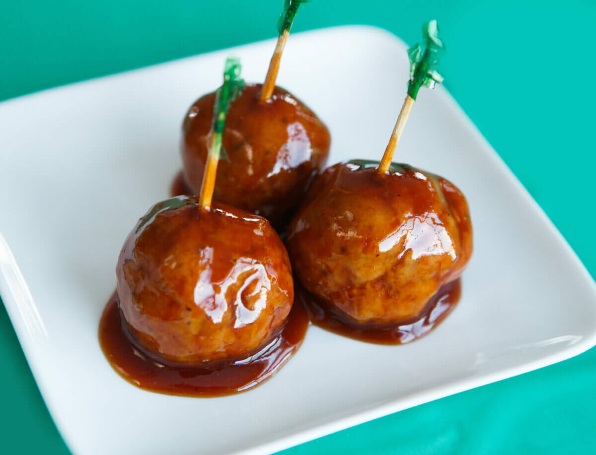 Dysphagia-friendly cocktail meatballs on white plate