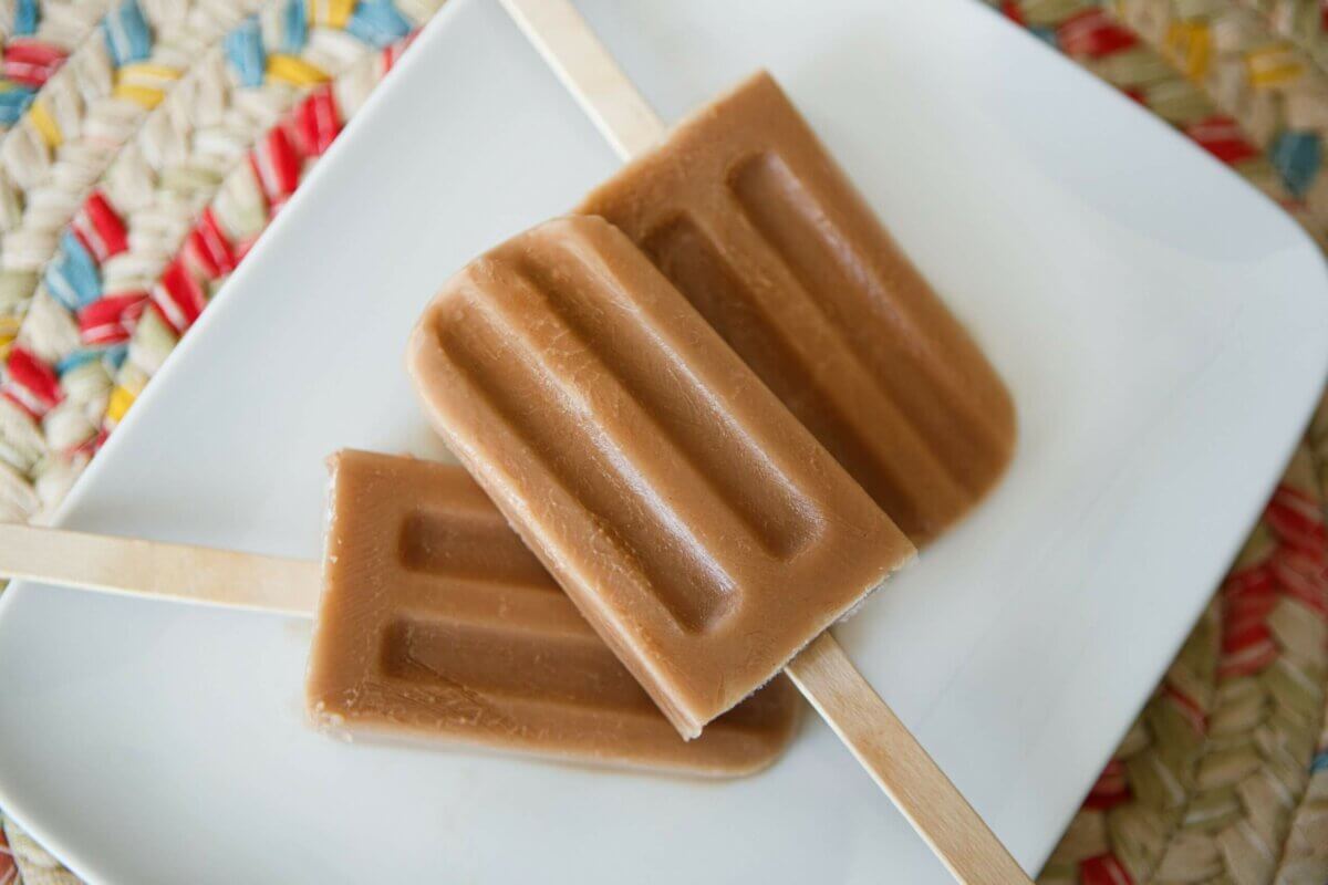 Dysphagia-friendly tootsie popsicles on white plate