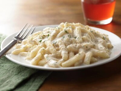 Chicken alfredo for dysphagia diets on white plate