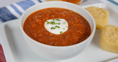 Dysphagia-friendly bowl of chili with sour cream on top