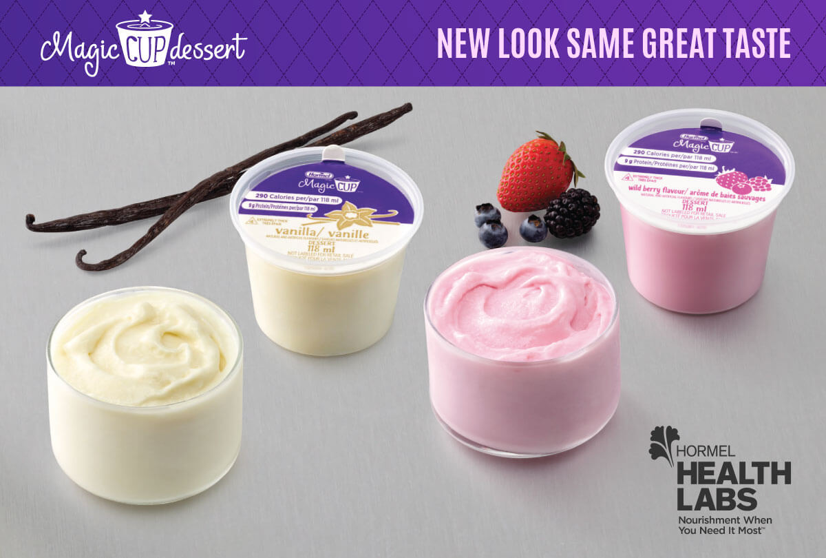 Vanilla and berry flavored magic cup in their new packaging on a metal counter. New look same great taste!