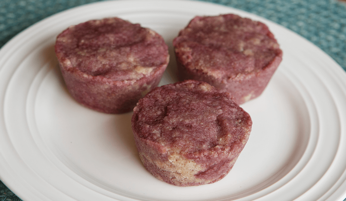 IDDSI Level 4 mixed berry muffins on a plate