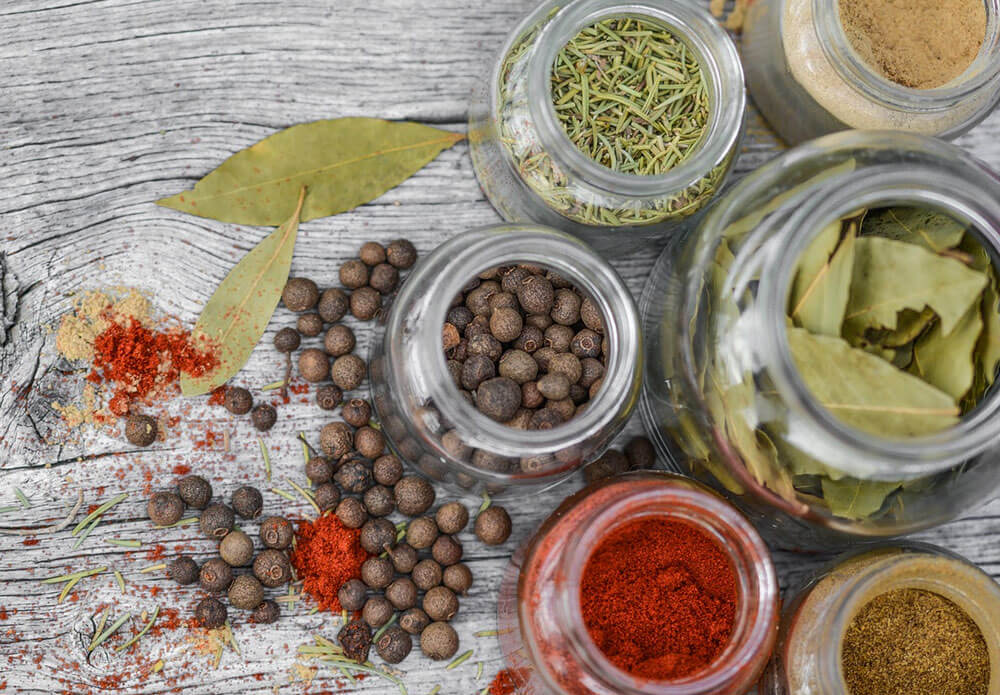 Spices in a jar sitting on a table