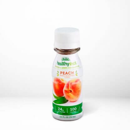 HealthyShot Peach flavor on table with white background