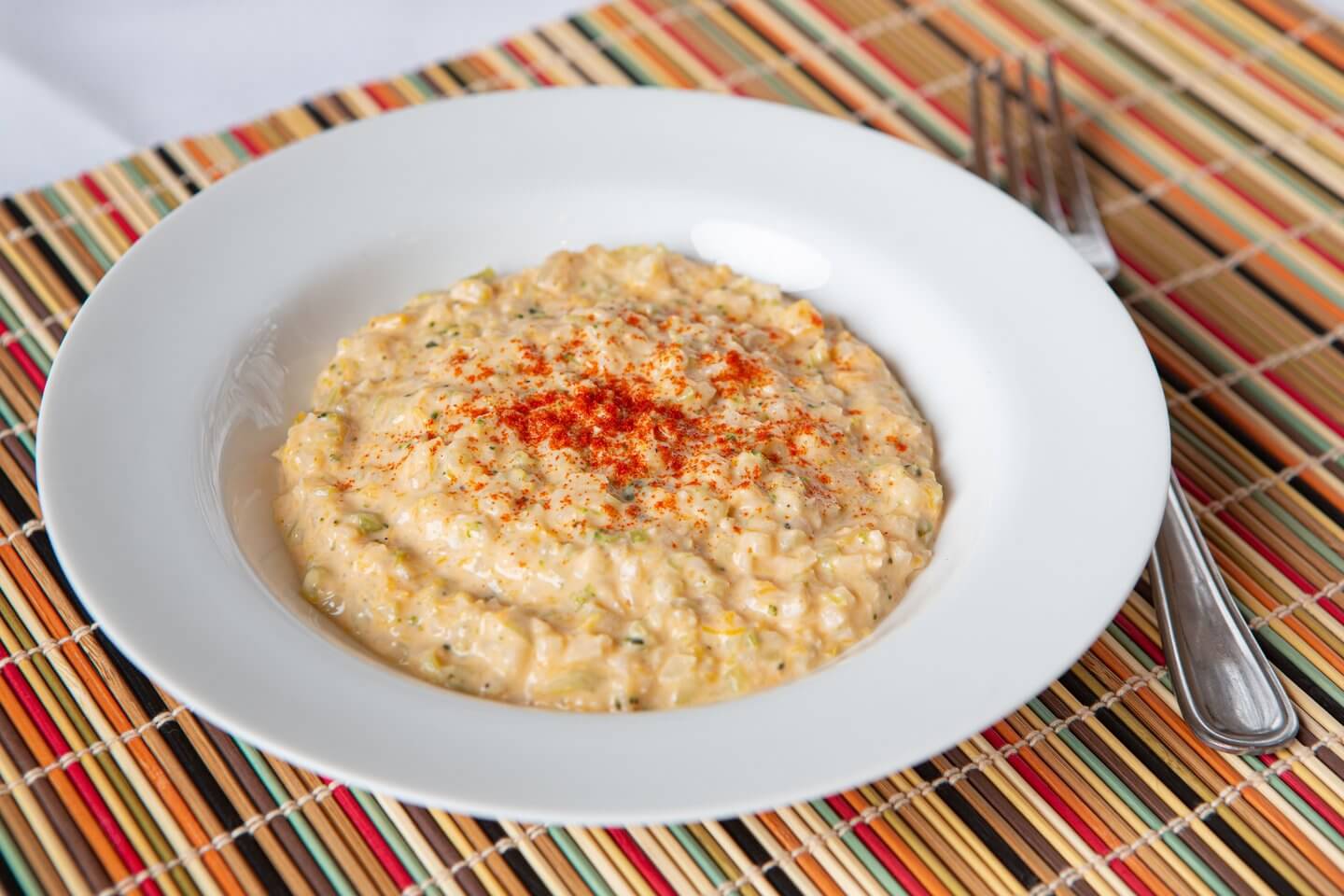 Pureed cheesy vegetable dish in bowl