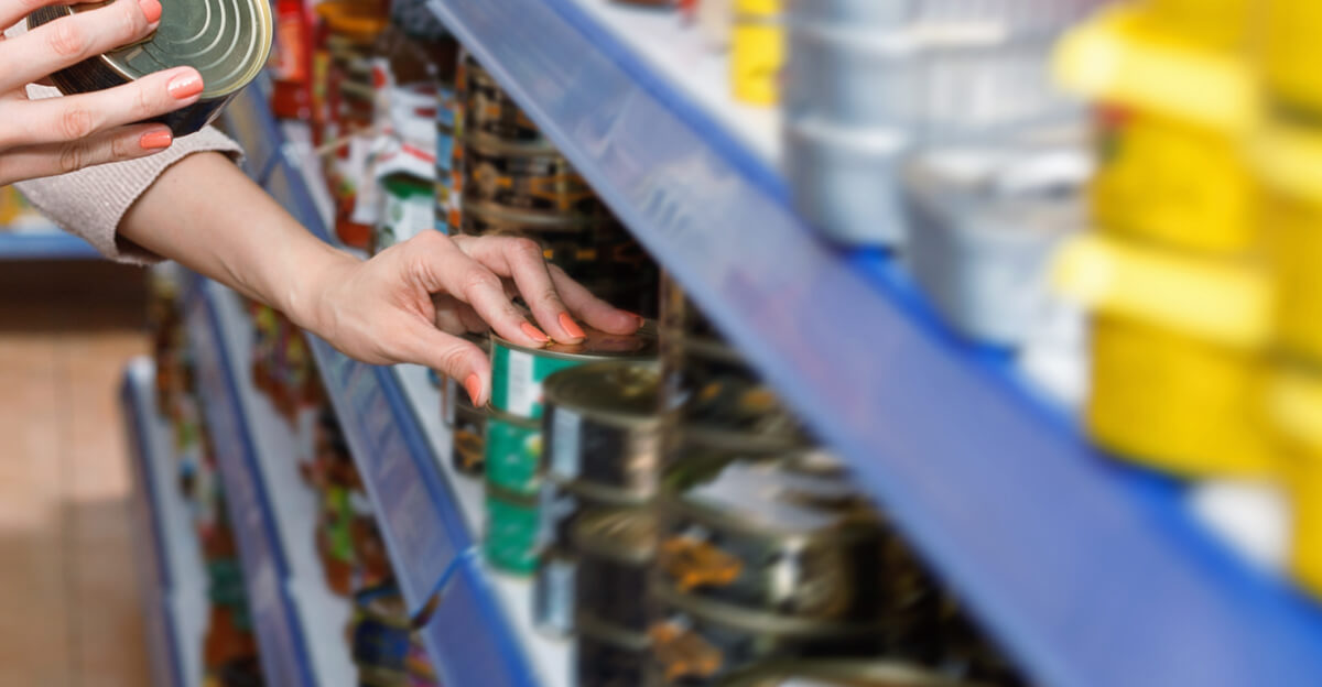 Person taking product off of shelf