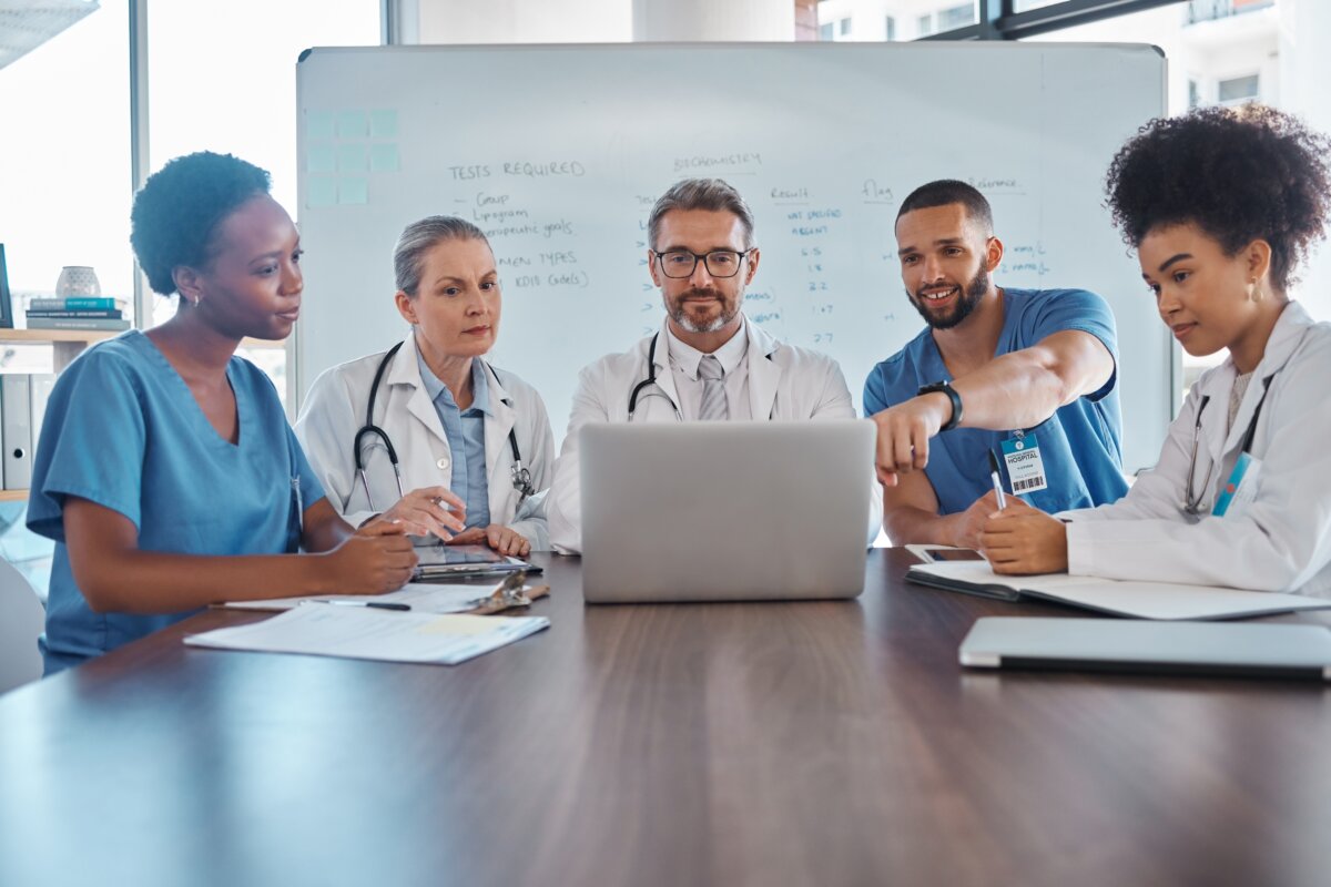 Nurses talking at a table