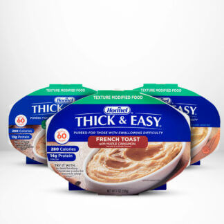 Three varieties of Thick & Easy Pureed meals in their packaging
